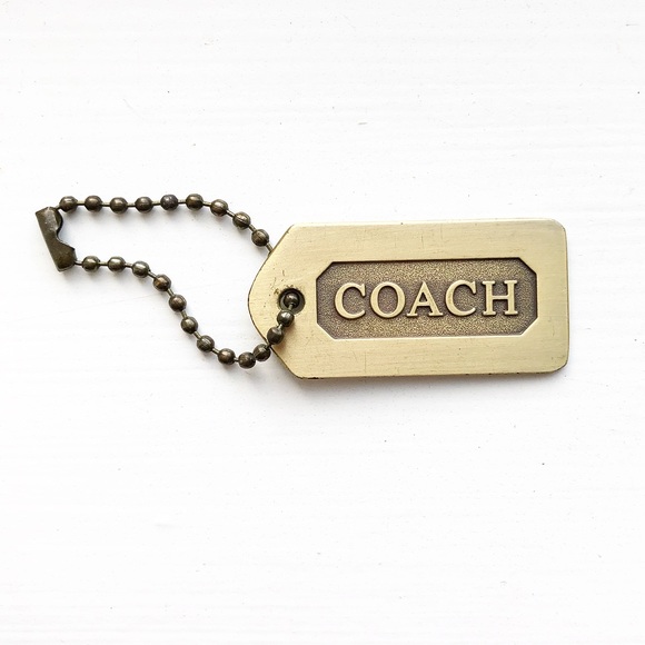 Coach Accessories - Chic brass Coach dog tag keychain